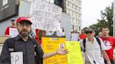 Protesters rally at city hall as politicians debate 'renoviction' bylaw