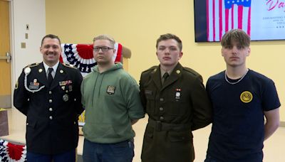 John Marshall High School students officially sign for the military