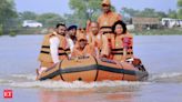 UP CM Yogi Adityanath inspects flood-affected areas in Shravasti; distributes relief materials - The Economic Times