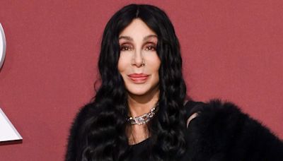 Cher Turns Back Time and Rocks Black Bodysuit Similar to One She Wore 35 Years Ago