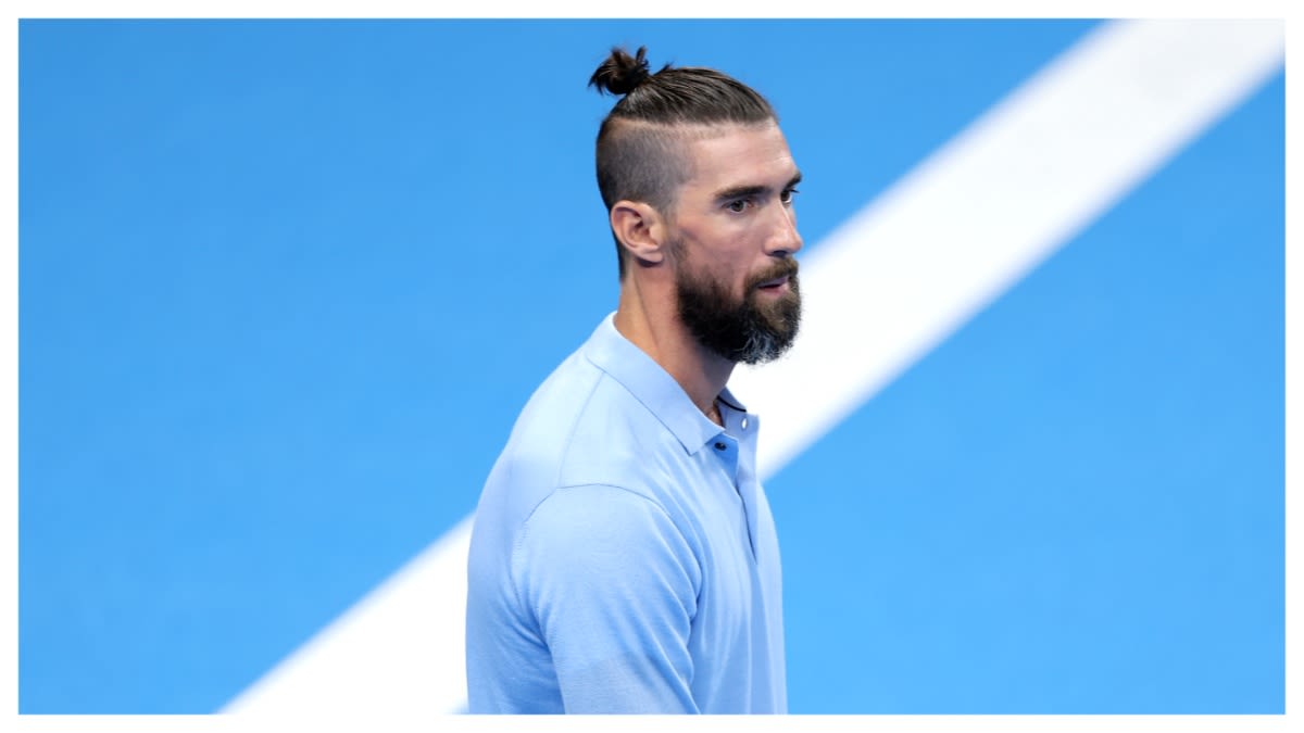 Michael Phelps' 'Silly' Man Bun Causes Waves as He Watches Simone Biles Compete