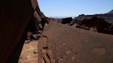 Stone Age animal engravings in Namibian caves guided Indigenous trackers over time