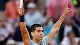Carlos Alcaraz saves match point to remain in French Open