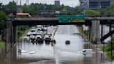 An indoor waterfall at Union Station: Downtown Toronto flooded as severe storm disrupts life in the region