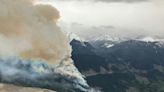 Rain, cooling slow huge blaze in Canada's Jasper park