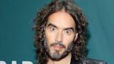 Russell Brand Was Reportedly Called Out As Sexual Predator Several Times On Camera