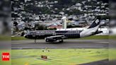 Crew member hits ceiling, passenger scalded with coffee as New Zealand flight faces turbulence - Times of India