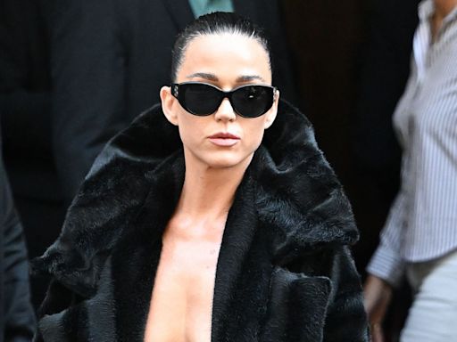 Katy Perry is topless in nothing but the lowest-rise ripped tights and an open jacket