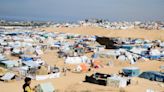 Children in Rafah flying kites to forget war, as Israeli military escalation looms in Gaza