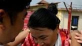 Nepali mountaineer Phunjo Lama, who clinched the record for the fastest ascent of Mount Everest by a woman, is greeted upon her arrival in Kathmandu