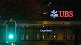 UBS shares slide 10%, Credit Suisse craters 60% after takeover deal