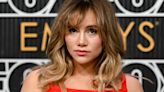 Suki Waterhouse tops off her layered bouffant with a retro starry tiara