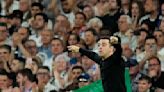 Xavi will stay with Barcelona for another season, AP sources say. Coach had planned to leave