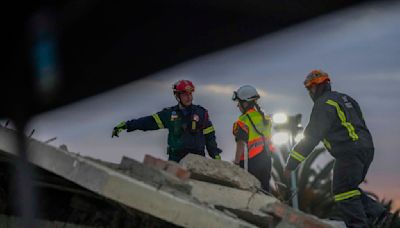 Dozens still missing after South African building collapse; 7 confirmed dead