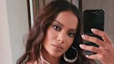 Anitta shows off her figure in colorful corset top for sultry selfie