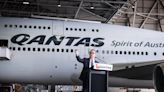 Qantas offers customers $34 vouchers to compensate for flight cancellations and says staff sick leave was partly to blame for chaos