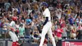 Brewers survive for 7-5 victory after withstanding Phillies' 9th-inning comeback attempt