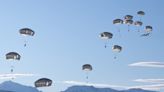 Photos show US Army paratroopers jumping out of giant C-17s into the freezing Arctic for an airborne assault. Soldiers say it's a rush.