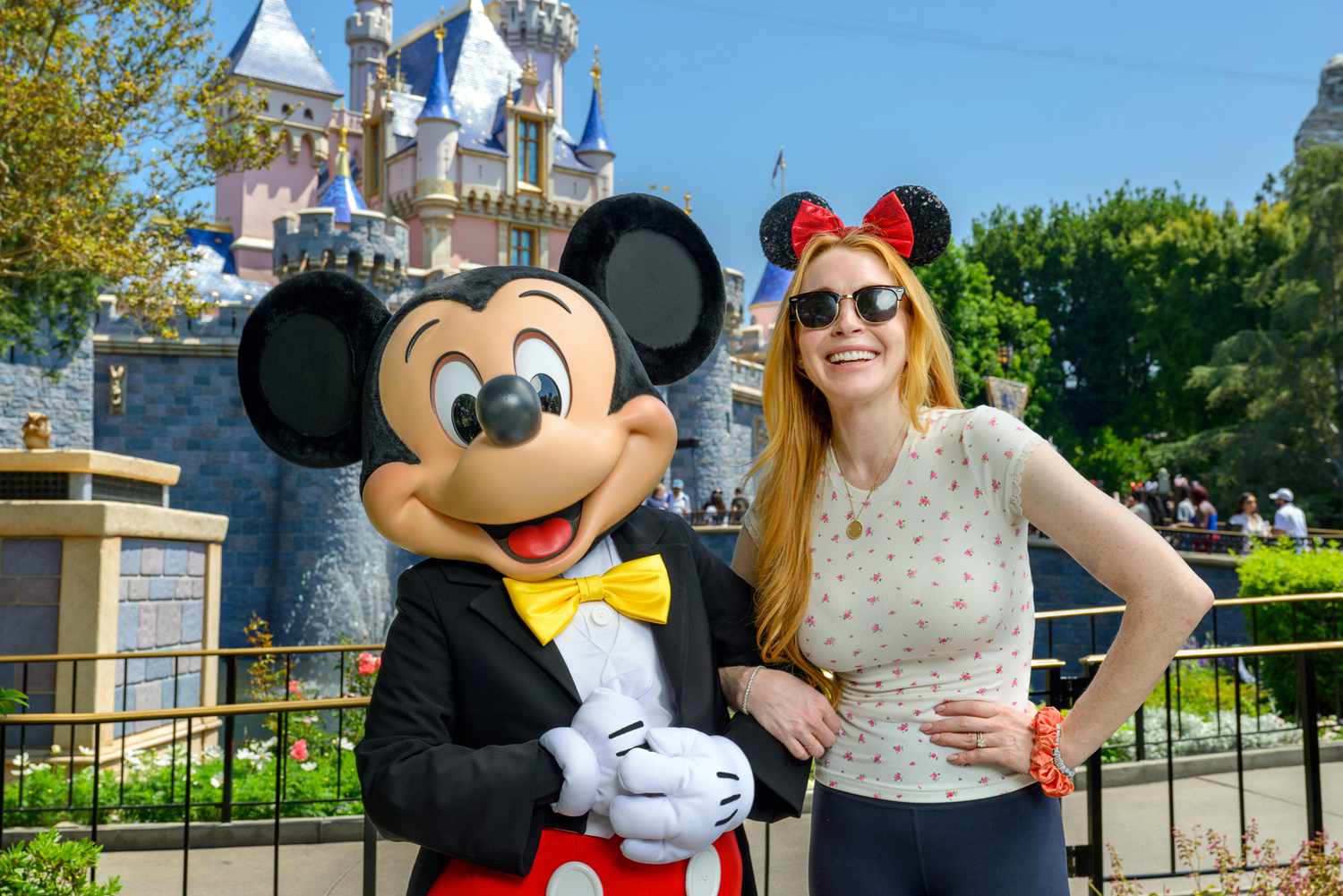 Lindsay Lohan Rocks Minnie Ears as She Reunites with Mickey Mouse at Disneyland: 'Let's Ride!'