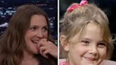 Jimmy Fallon surprises Drew Barrymore with a clip from her first 'Tonight Show' appearance in 1982: "My legs don't touch the ground"