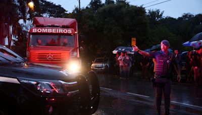 61 killed after plane crashes in Brazil, officials say. Video shows aircraft plummeting.