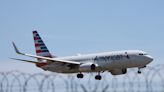 An American Airlines flight attendant was charged over claims he photographed minors in airplane bathrooms