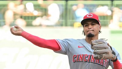 Trailing early, Reds halt Brewers' win streak at 5