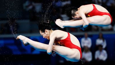 China dives into medal table with Paris' 1st golds