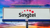 Singtel warns of loss after $2.3B in writedowns