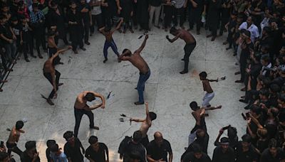 Shiite Muslims mark holy day of Ashura with mourning and self-flagellation