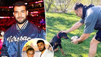 Britney Spears’ ex-husband Sam Asghari slaps mystery woman’s butt on dog park date after divorce