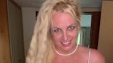 Britney Spears licks the camera as she rocks tight white lingerie set in video