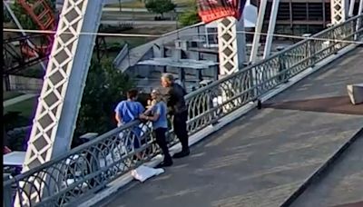 Moment rock legend Bon Jovi convinces woman not to leap from bridge