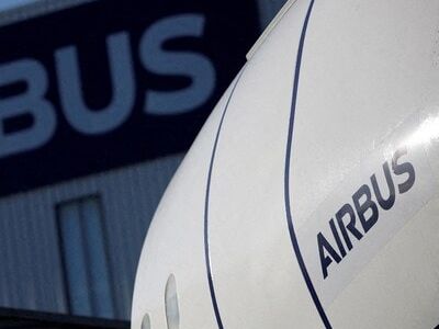 Airbus cuts key industrial, financial targets, takes hefty space charge