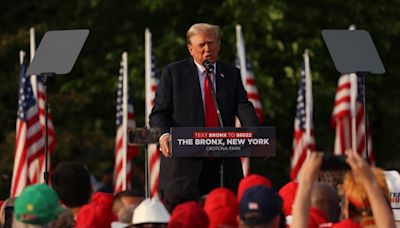 Trump met with ‘build the wall’ chants as he goes on anti-migrant rant at Bronx rally