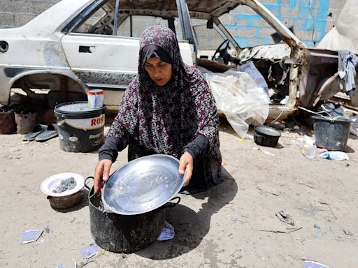 Israeli forces kill dozens of Palestinians in Gaza strikes, battle Hamas in Rafah