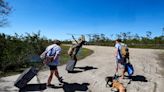 Amid 'gut-wrenching' destruction from Ian, Florida barrier island residents band together