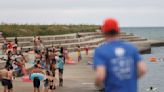 Two men in critical condition after being pulled from water at different Lake Michigan beaches Thursday night