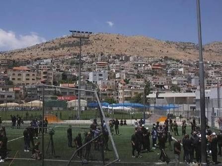 Residents mourn 12 children killed in rocket strike in Golan Heights