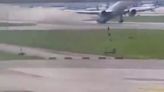 Terrifying moment Boeing 777 tail smacks tarmac as pilot forced to abort flight