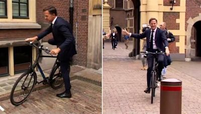 Off to Brussels in style: Ex-Netherlands PM Mark Rutte leaves office on bicycle after handing over power to successor Dick Schoof