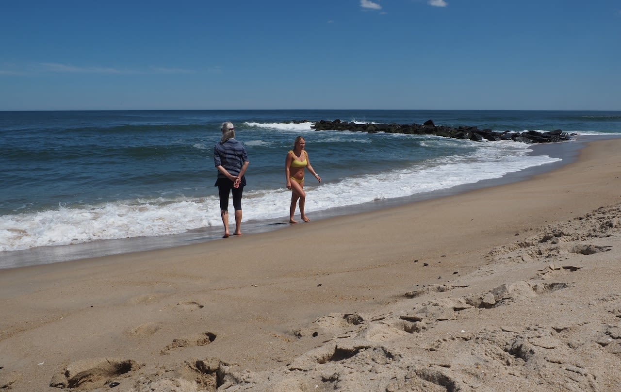 Jersey Shore town bans digging large holes, burying people in sand