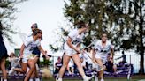 Rain? So what. Reign? That's what Northwestern's women's lacrosse team is all about