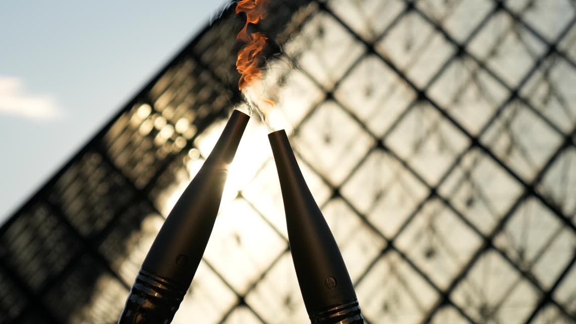 Who will light the Olympic cauldron at the Opening Ceremony?