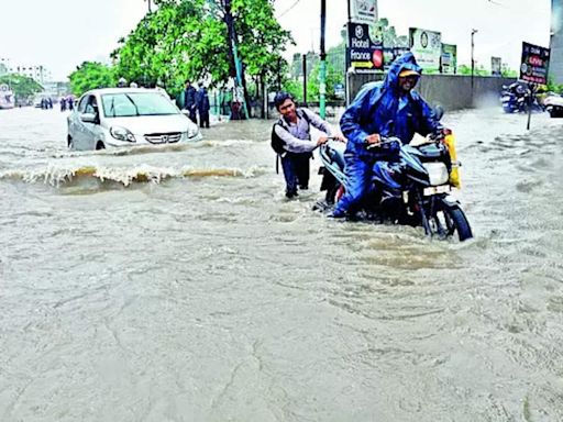 Heavy rain disrupts life in Surat city | Surat News - Times of India