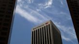 Bank of America profit hurt by losses on credit cards, office loans