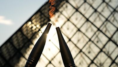 Who will light the Olympic cauldron at the Opening Ceremony?