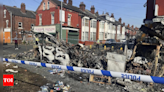 Riots flare in another UK city as police brace for weekend turmoil - Times of India