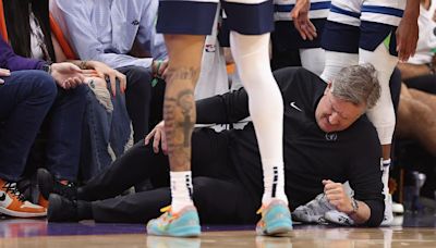 Minnesota Timberwolves head coach Chris Finch injured in mid-game collision with player