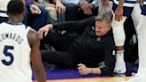 Timberwolves coach Chris Finch has torn patellar tendon in right knee after collision with player